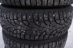 Vinterdäck/dubbdäck Pirelli 195/65R15 95T på fälg. B243