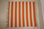 Plastmatta orange-multifärg. B125