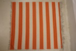 Plastmatta orange-multifärg. B125
