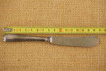 Smörkniv med silverhandtag. A25