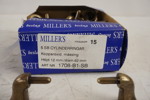 Miller´s Möbelhandtag i trä med mässing ringar. D103