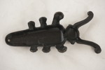 Stövelknekt i gjutjärn formad som en skarabé. C18