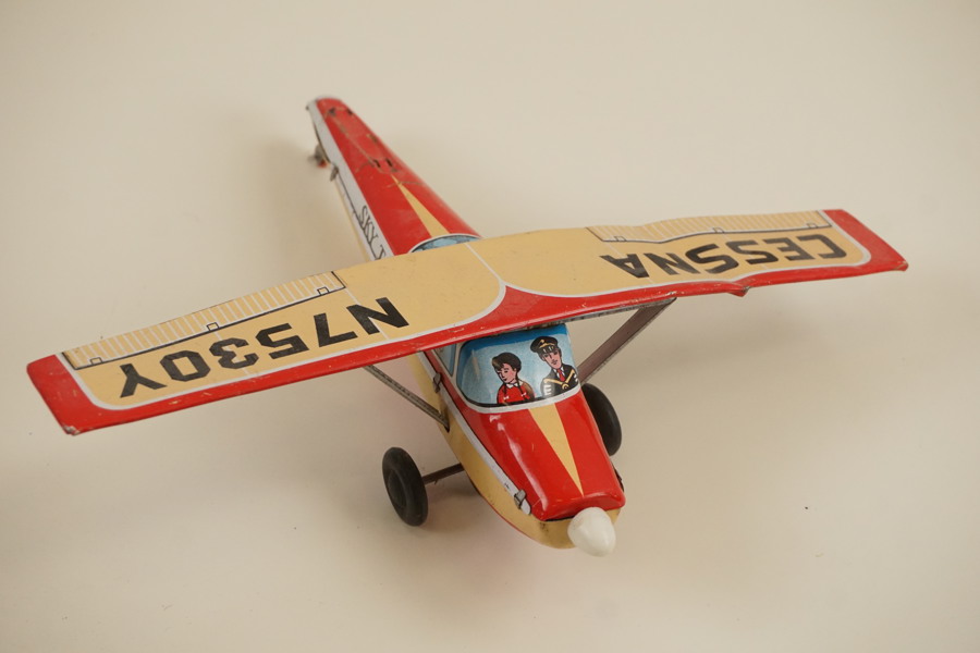 Vintage Leksaksflygplan i plåt, sky taxi. A150
