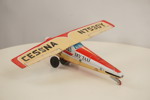 Vintage Leksaksflygplan i plåt, sky taxi. A150