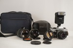 Praktica kamera reflex , blixt 3st objektiv mm. D115