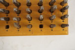 Sifferstansar, numer & bokstäver. D25