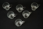 Vinglas, kaffekoppar i glas, ljusstake. G12/