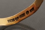 Guldring med planslipad onyx 18k 5,8g. A39/