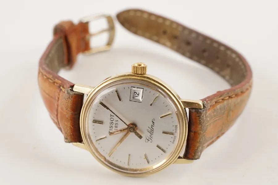 Tissot Goldrun guld armbandsur 14k. A156