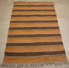 Plastmatta brun/orange 114x150. B231