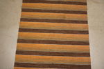Plastmatta brun/orange 114x150. B231